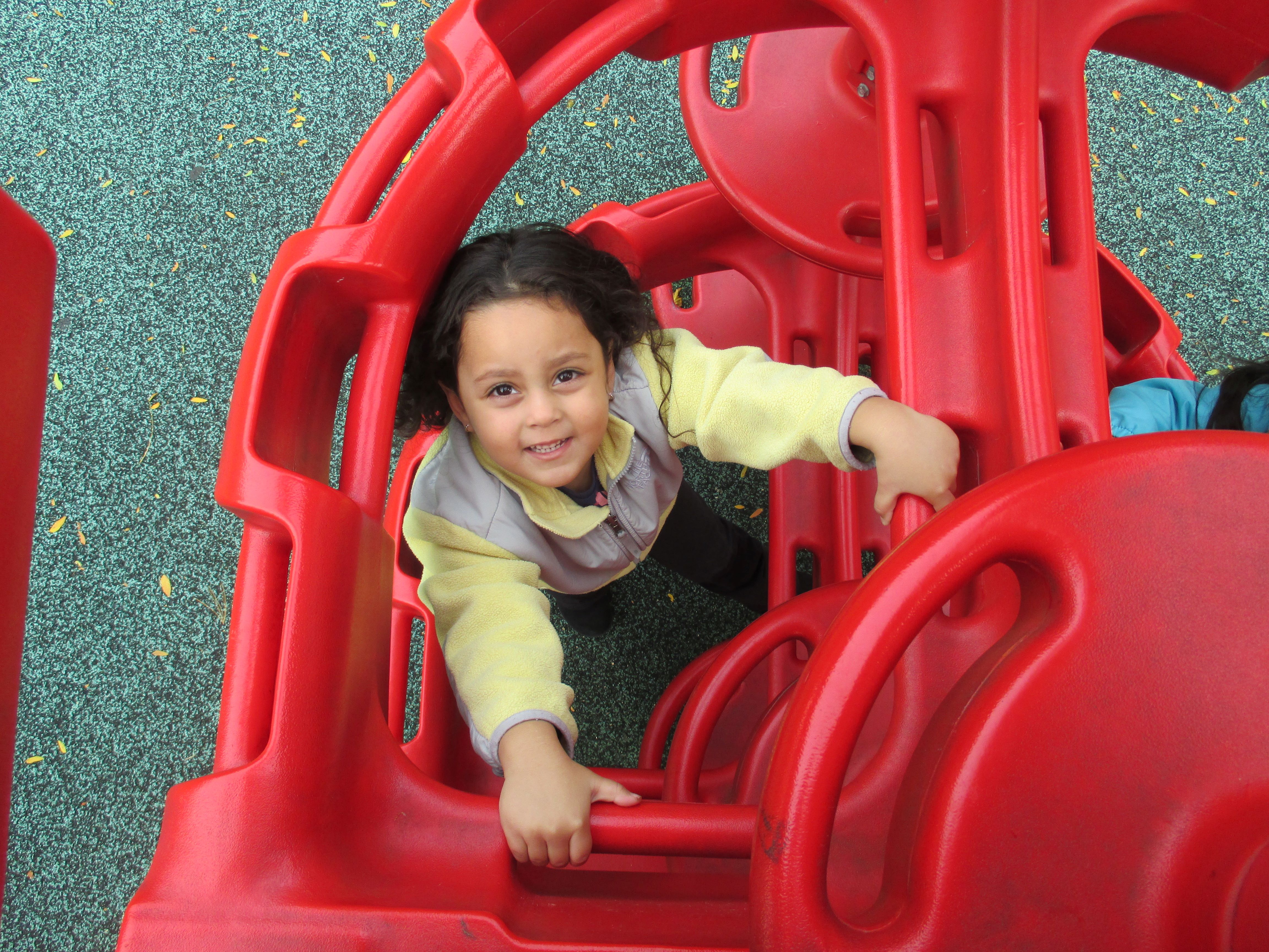 Little girl on slide 